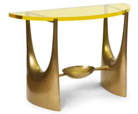 Foto di un tavolo dal design glod.