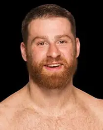 Il corpo di Sami Zayn misura il peso dello statistico statistico statistico del bicipite