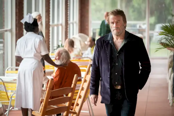 John Travoltas 'The Poison Rose' är en annan tråkig Whodunit Ingen vill se