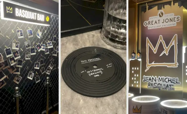 Una targa circondata da graffiti