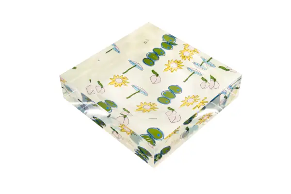 akryylikaramelli, jossa oliivi- ja auringonpaistekuvio